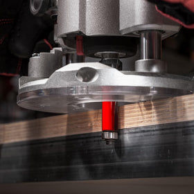 Laminate trimming in action using Freud 42-104 with handheld router