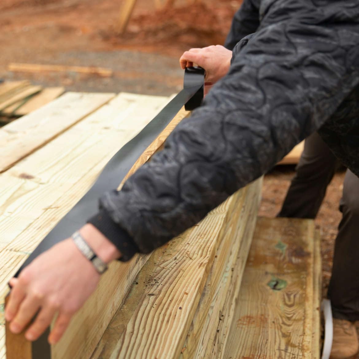 FrogTape Pro Grade UV-resistant tape protects ledger boards outdoors