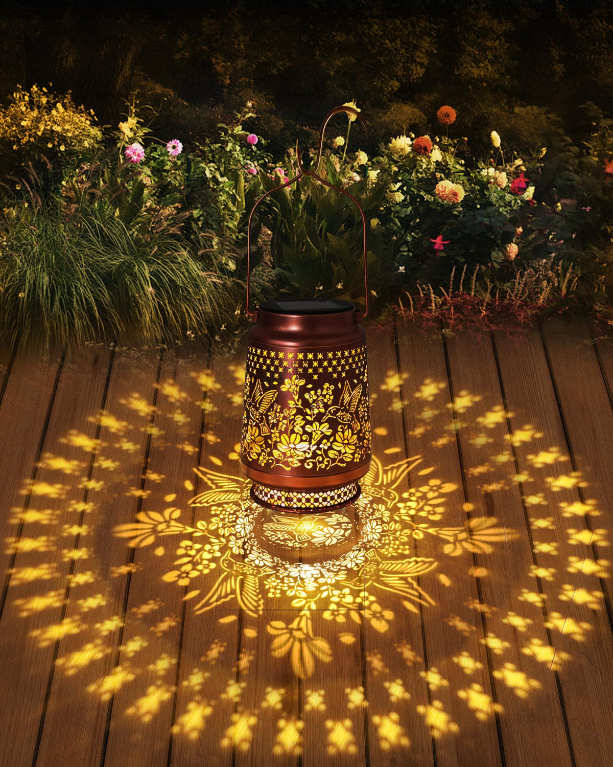 Hanging Fussion solar lanterns casting decorative light on a patio