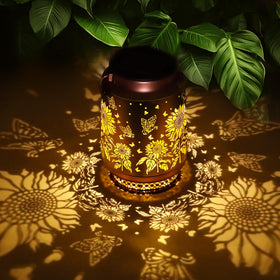 Fussion sunflower garden lantern front view glowing softly for outdoor ambiance