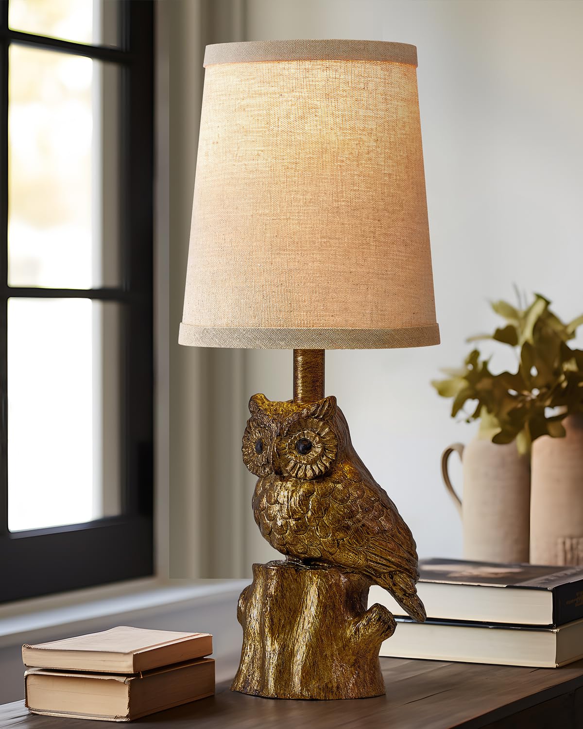 G-SAFAVA owl table lamp front view with gold finish improves living room ambiance.