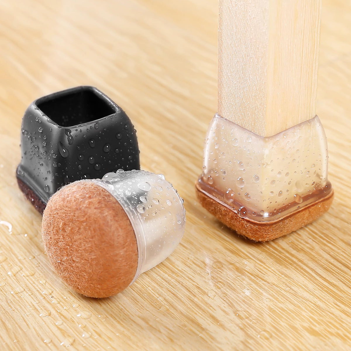 GAGUIUP felt pad bottom with integrated silicone sleeve shown on furniture leg.