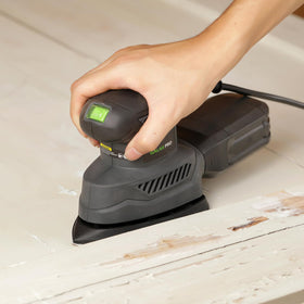 One-handed operation demonstrated on wood surface