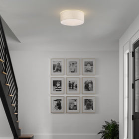 Galtlap E26-base drum fixture accepts common bulbs for flexible brightness.