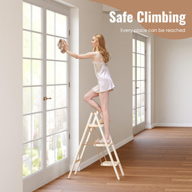 GameGem 3 Step Ladder reaching the kitchen fridge top shelves.