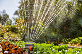 Adjustable range and width controls allow flexible garden coverage.