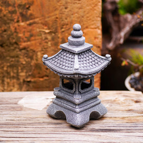 Gardenfans Solar Pagoda Lantern at dusk casting soft pathway light