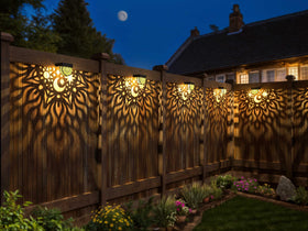 Gardsee solar deck lights mounted on wall brighten outdoor paths at dusk.