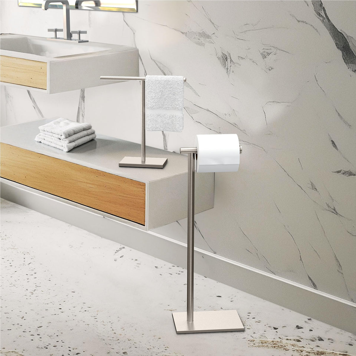 Gatco 1431SN curved dowel arm enables easy paper dispensing.
