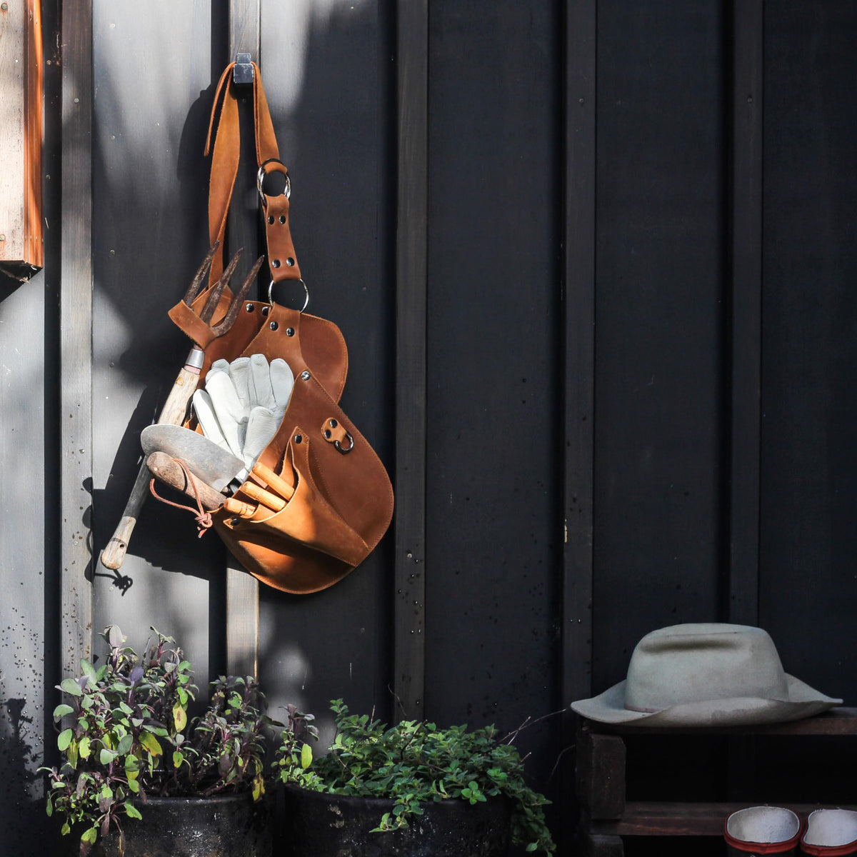In-use shot shows hands-free gardening with the belt