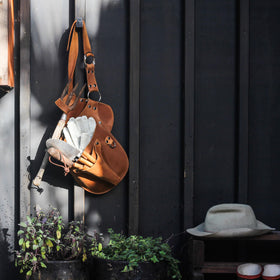 In-use shot shows hands-free gardening with the belt