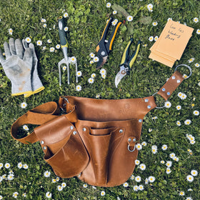 Tool holder secures knives and pruners during work