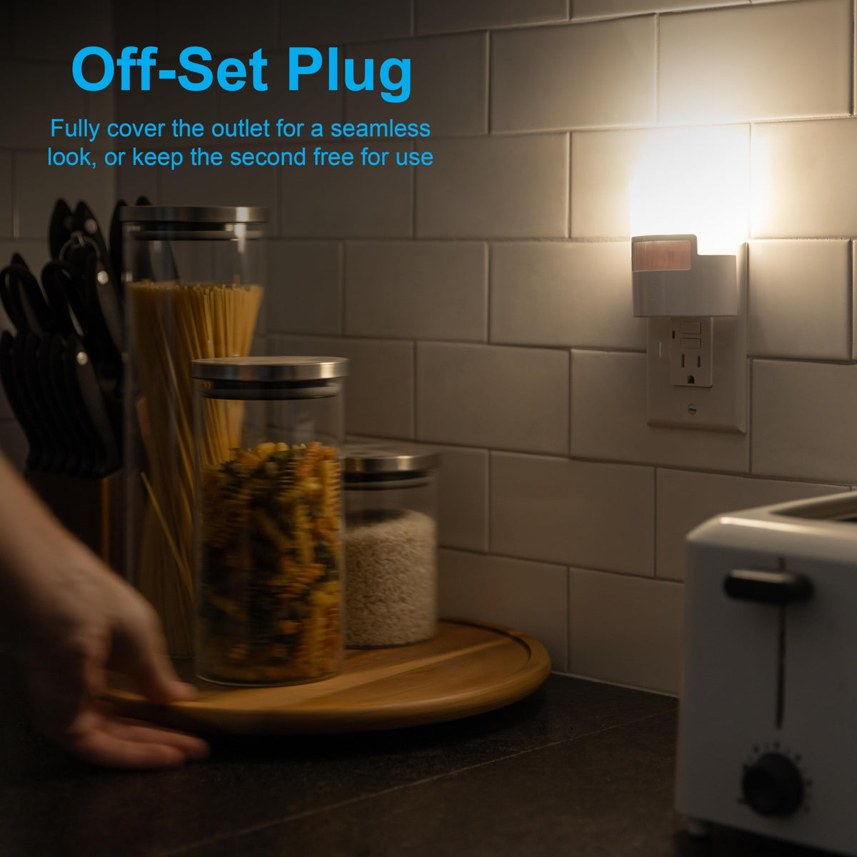 GE compact plug-in night light leaves the second outlet free for use.