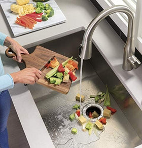 GE Disposall stainless-steel sink flange and turntable resist corrosion.