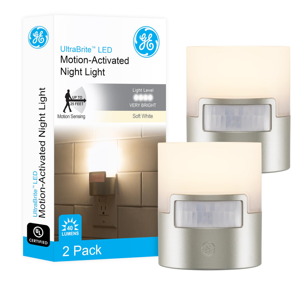 GE LED motion sensor night light plugged into outlet with motion-activated illumination