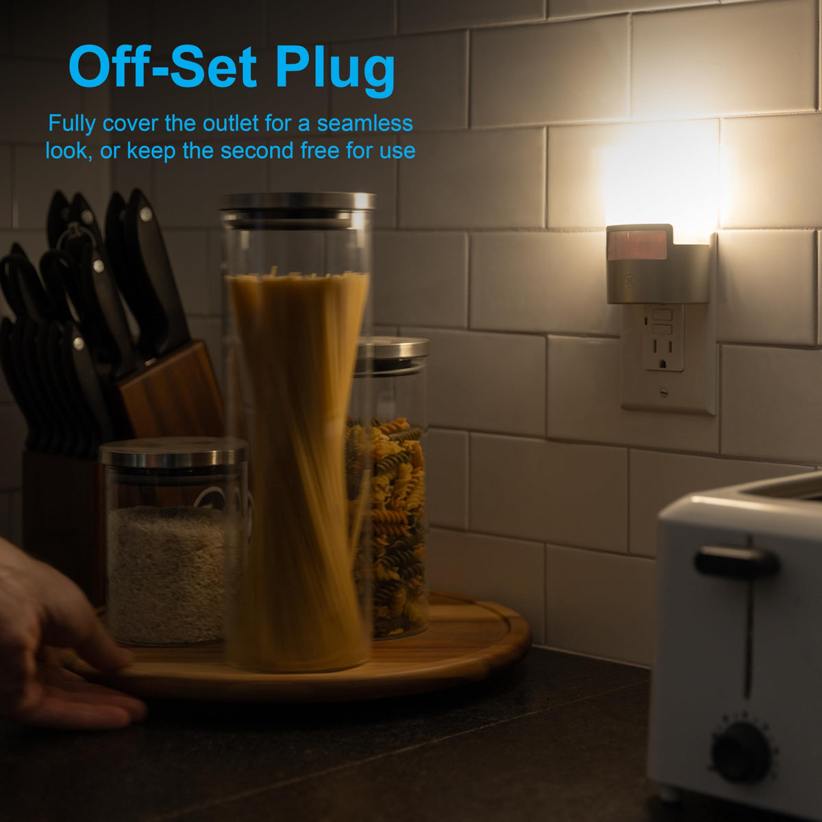 GE compact design night light fits standard outlets while leaving the second free