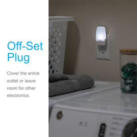 GE night light plugged into wall showing sleek glossy white finish