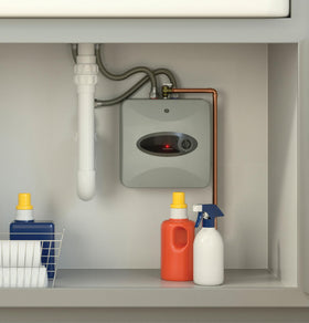 GE thermostat control knob for easy temperature adjustments.