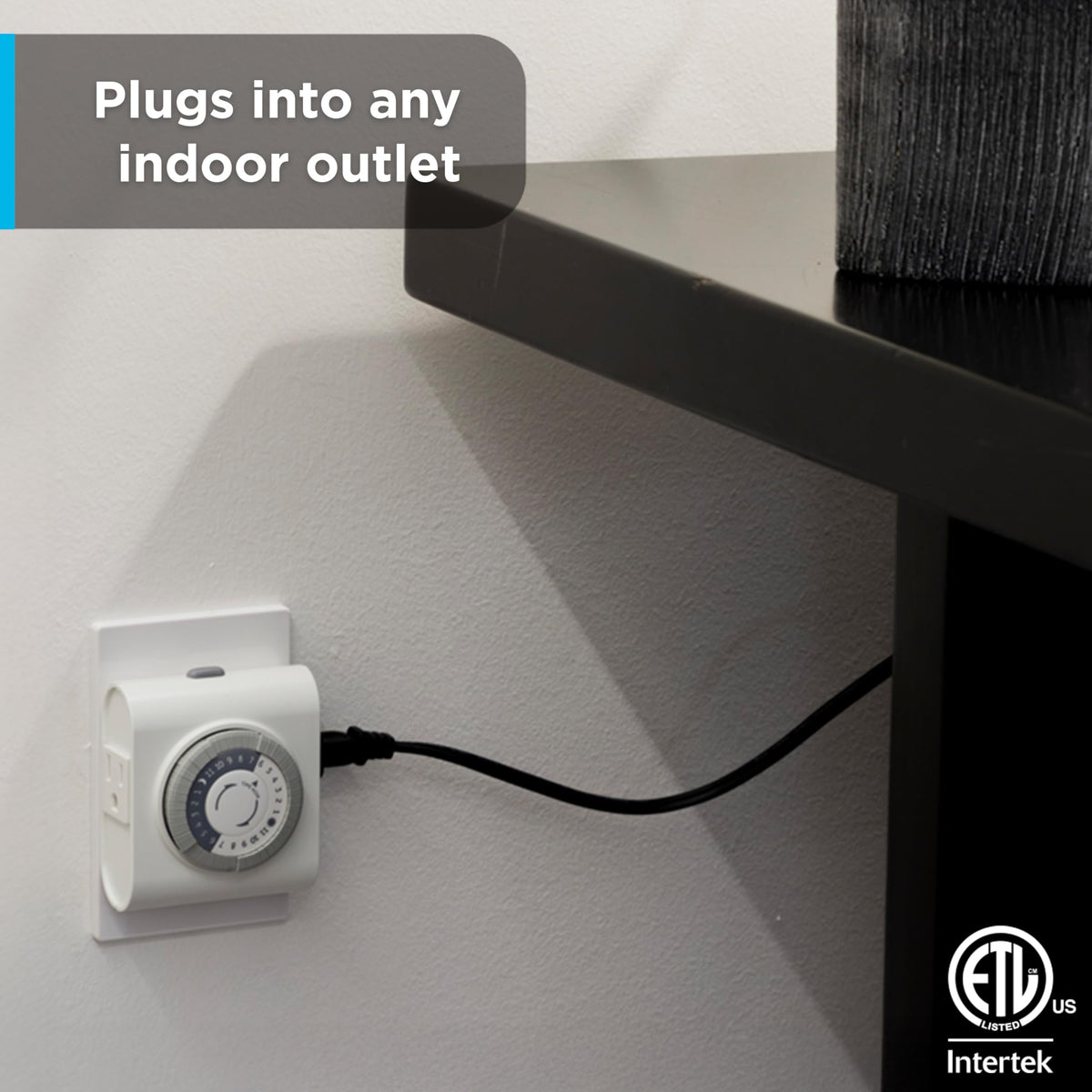 GE side-access design guides cords along the wall for hidden wiring.