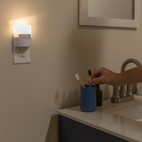 GE energy-efficient night light stays cool to the touch and uses minimal energy.