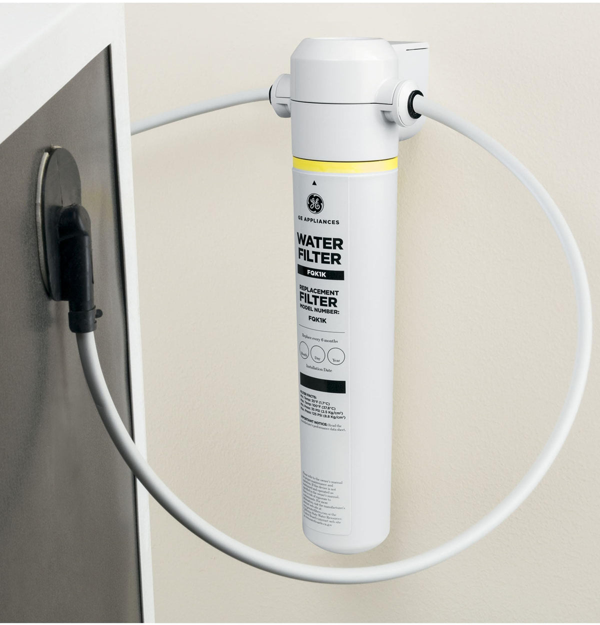 GE FQK1K filter cartridge close-up highlighting fine filtration