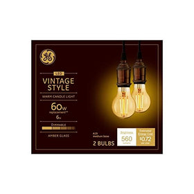 GE Vintage LED amber glass A19 bulb close-up showing warm candlelight for decorative fixtures.