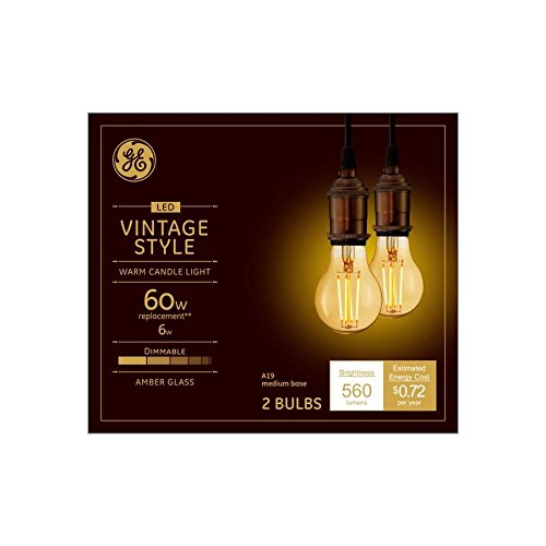GE Vintage LED amber glass A19 bulb close-up showing warm candlelight for decorative fixtures.