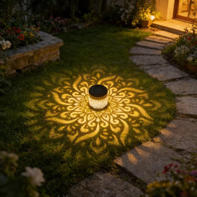 Generic decorative solar mandala light at entry adds welcoming illumination.