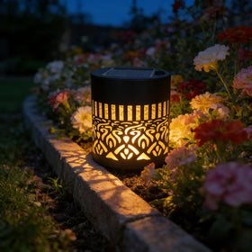 Generic decorative solar mandala light on deck enhances outdoor ambiance.