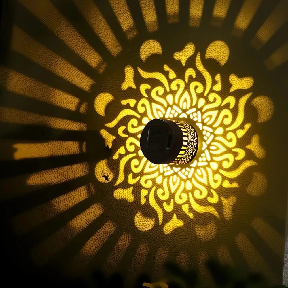 Generic decorative solar mandala light on garden post adds warm, welcoming glow.