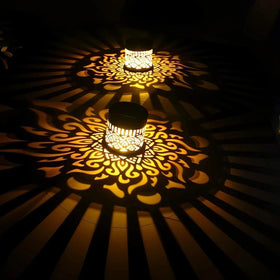 Generic decorative solar mandala light over yard path guides evenings with soft glow.