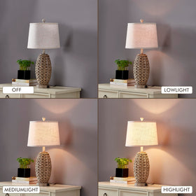 Generic farmhouse style bedside lamps pair with oatmeal shade for soft ambient light.