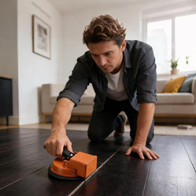 Generic floor gap fixer tool near hardwood edge minimizes damage during use