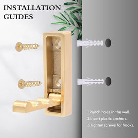 Generic gold wall hooks entryway use to hang coats hats and bags.