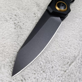 Generic push button lock knife blackstonewashed finish highlights tactical style.