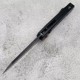 Generic push button lock knife compact EDC design fits pockets.