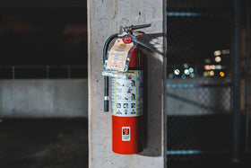 Generic Strike First dry chemical cylinder detail highlights versatile protection.