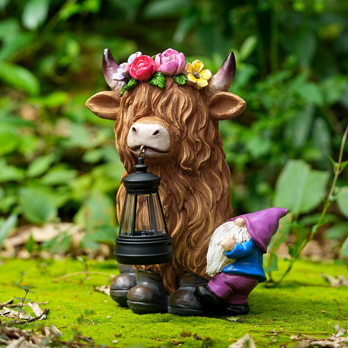 Generic TOLIMI resin statue with solar lighting for evening ambiance.