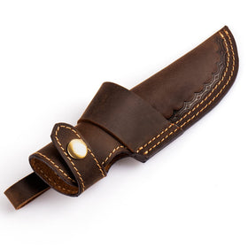 Gentlestache horizontal knife sheath on belt for secure EDC.