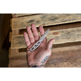 Closed Gerber Paraframe Mini measures compact length for pocket storage.