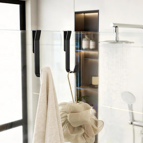 Getube towel and bath essentials neatly hung with ease.