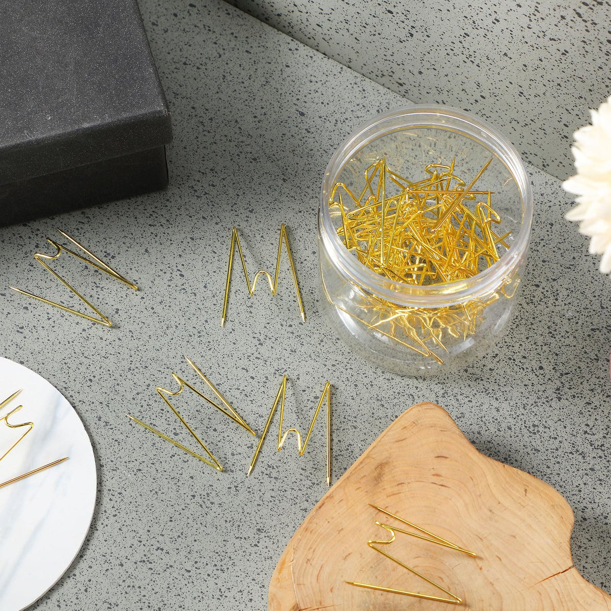 Geyoga set of 36 hooks stored in a clear plastic box.