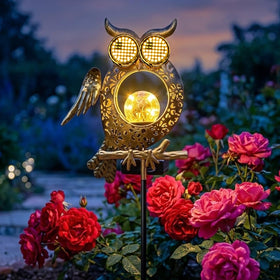 GEYUEYA Home solar owl light outdoors provides pathway illumination with charming motion.