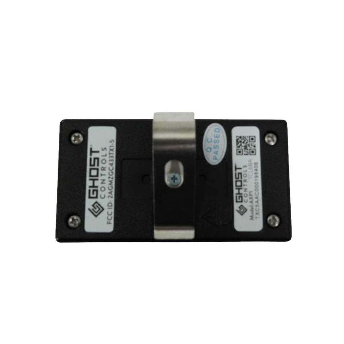 Ghost Controls AXP1 remote battery compartment open, emphasizing easy CR2032 power replacement.
