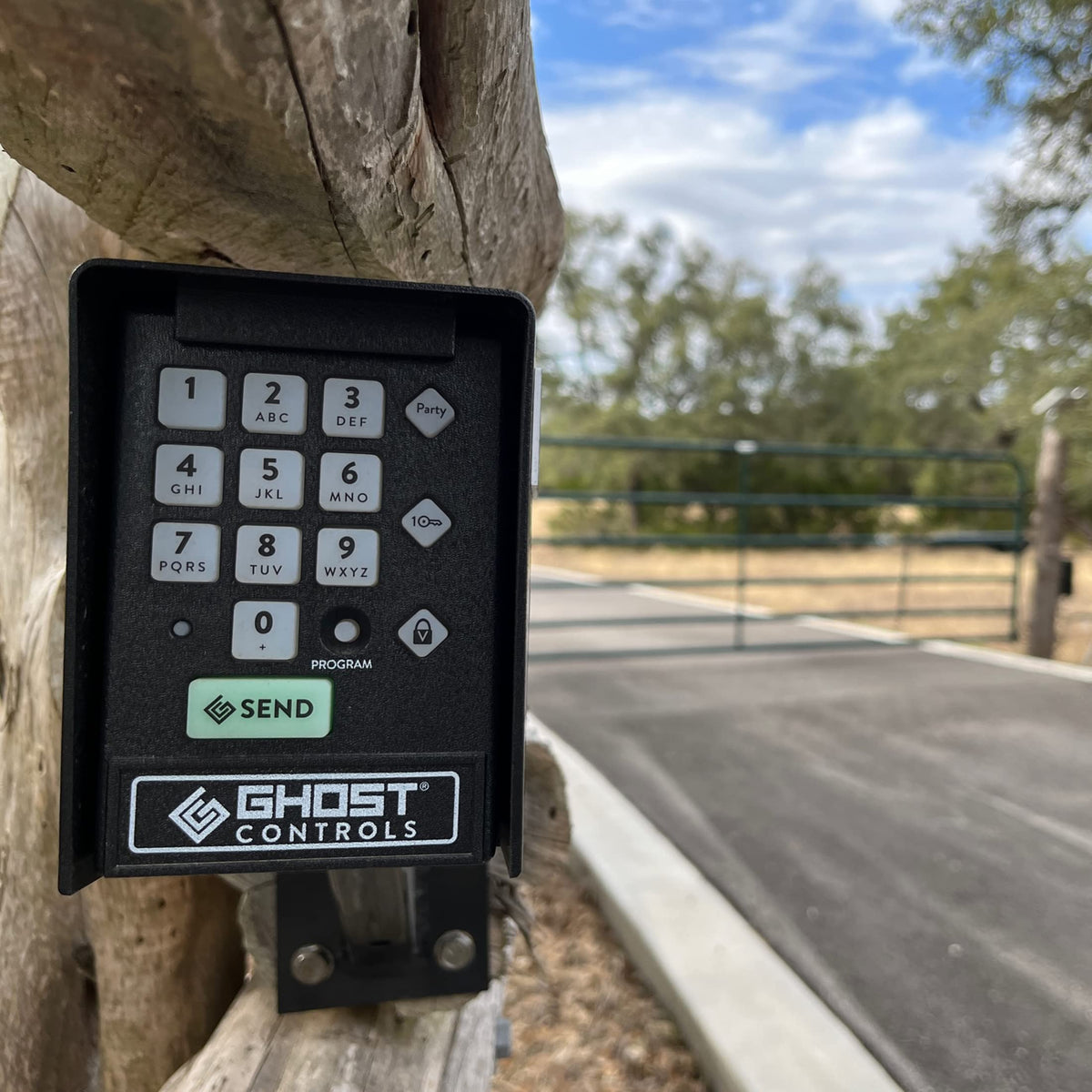 Ghost Controls AXWK keypad mounted on AXGN pedestal for stable installation.