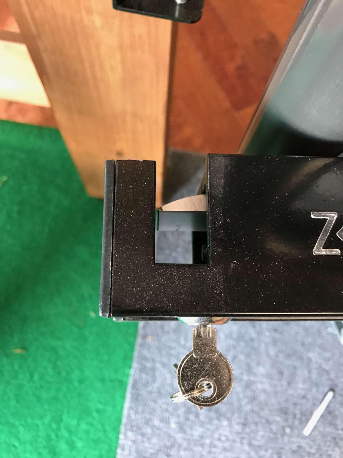 Ghost Controls AXZL ZombieLock wiring cable connected to gate opener controller.