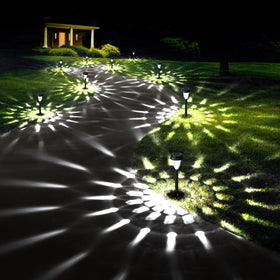 GIGALUMI twelve-pack pathway lights brighten walkways with elegant solar power