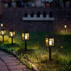 GIGALUMI candle-effect lights set a soft ambiance for nighttime parties