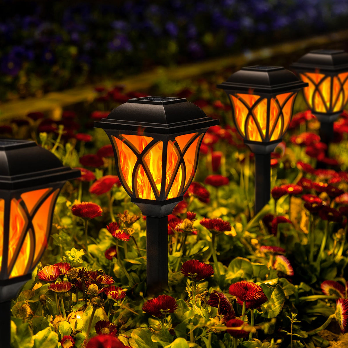 GIGALUMI solar lights with flickering flame pattern lighting an outdoor walkway