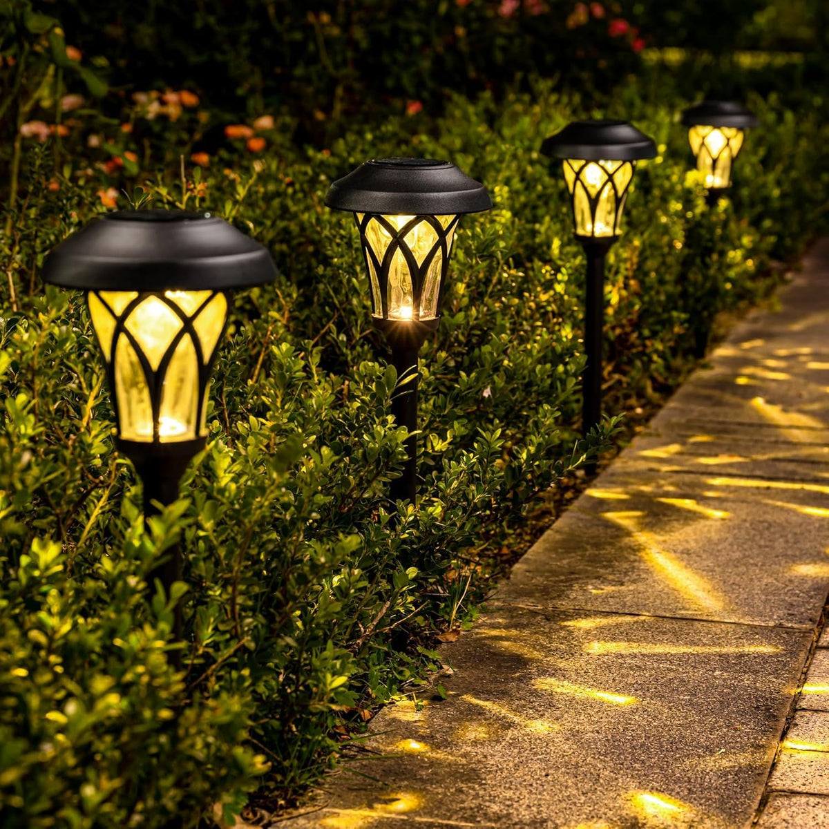 GIGALUMI warm white glow lines walkways and patios for inviting nighttime ambiance.
